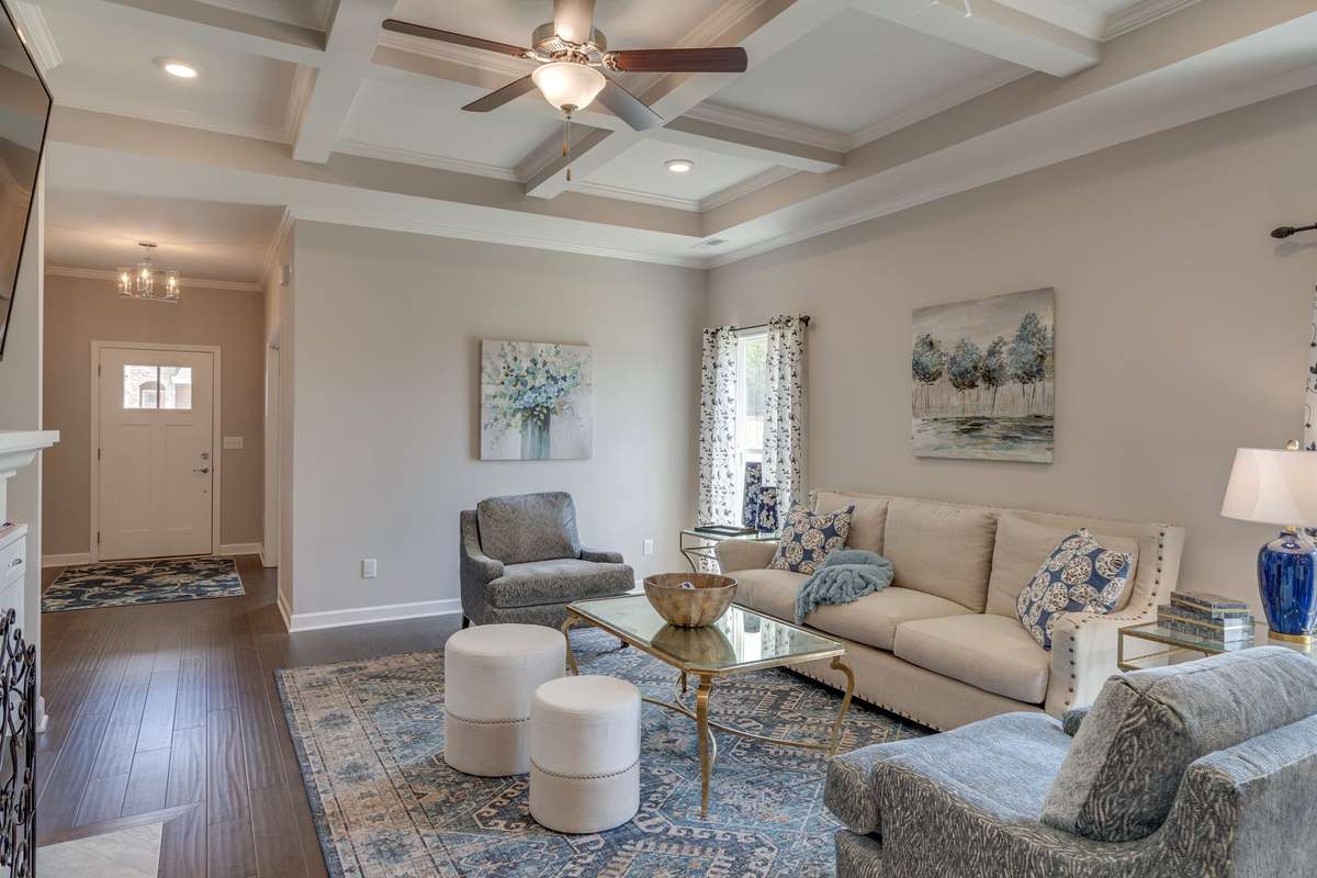 Coffered ceiling in your living room!
*previously built home, actual selections and finishes may vary