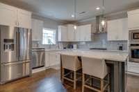 Spacious kitchen!
*previously built home, actual selections and finishes may vary