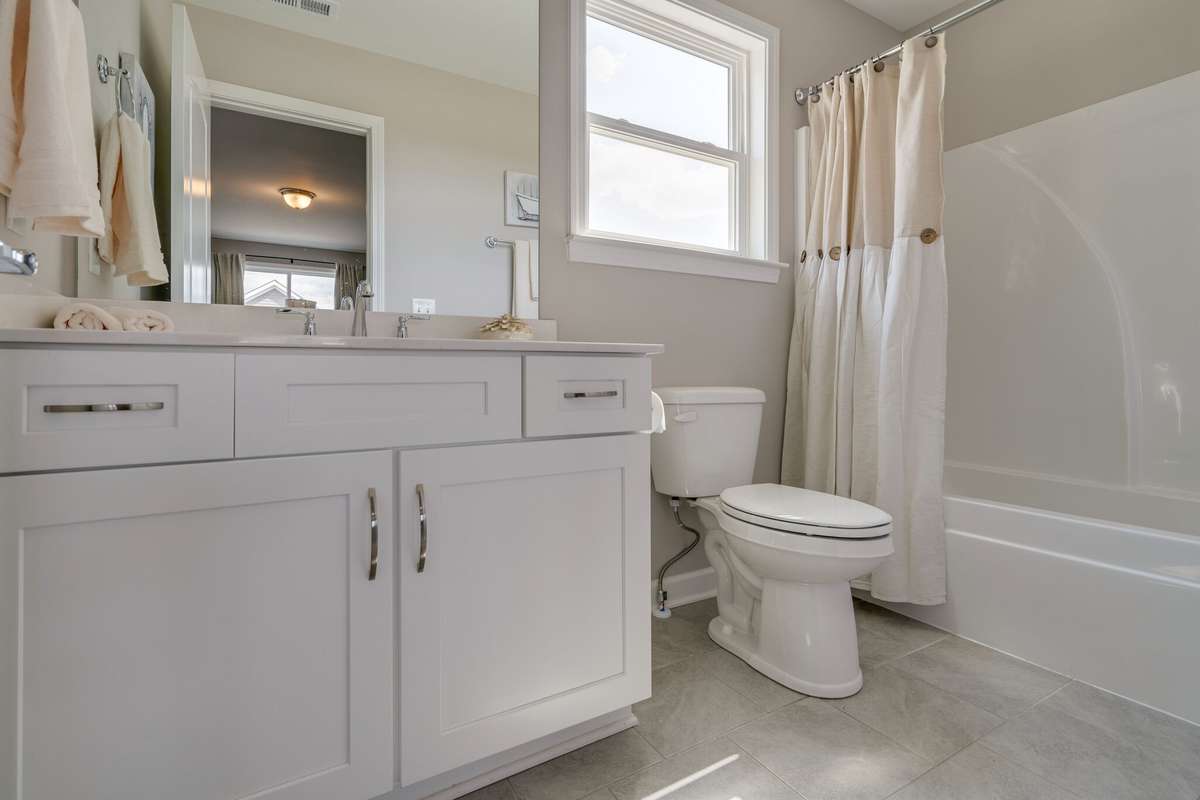 Full bathroom upstairs off of your bonus/additional bedroom
*previously built home, actual selections and finishes may vary