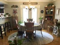 Dining room with brand new French doors with internal louvers