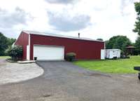 30'x50' 3 car garage with a 12' lean to on the back side