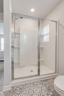 5 foot shower with glass enclosure in owner's suite.