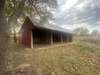 Horse stables can also store boats. Stable has a sliding door on the side