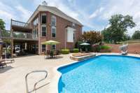 Enjoy entertaining in the spacious pool area.  Saltwater Pool and Jacuzzi liners ~ 2 years old.  Outdoor shower is fully operational for greater ease to clean up before coming in from a day at the pool.