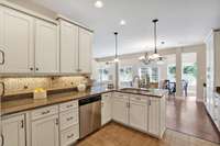 Under and Upper Cabinet Lighting with Gorgeous Tile Backsplash.