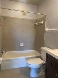 Master bedroom bath with ceramic floor and surround