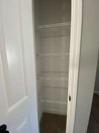 Linen closet  *Photo is from a finished neighboring unit with same floor plan*