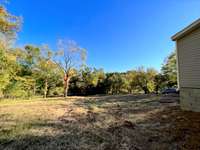 Partial view of the large front yard space