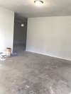 looking from the front door toward kitchen and dining area