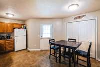 Another view of the kitchen. The double doors are the laundry area.