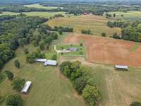 Aerial view of the house and the buildings.  Tobacco barn not in this photo.