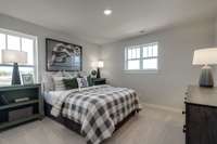 Secondary bedrooms are good size and have walk-in closets