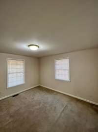 second bedroom with walk in closet