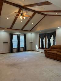 lots of natural light in the great room with bay window and additional windows. 