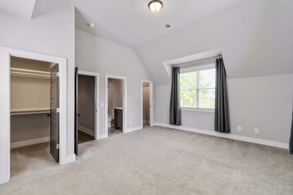 Upstairs, Bedroom #2 could also be used an a Primary Suite. Two closets, plus a full bath ensuite.