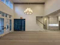 Stunning Two-story Dining Room, Wine storage with Iron Glass Door  *This home is under construction. Photo updated 4/9/24