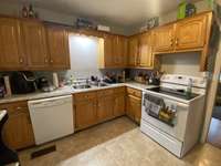 Dishwasher, Stove and Refrigerator will stay with the home