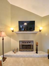 Natural gas fireplace with heat setting.  Once your room hits desired temperature, the fireplace minimizes flame... doing the work for you.