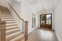 Beautiful foyer with double front doors