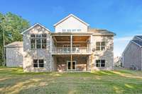 Enjoy covered deck and patio.