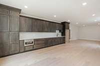 Basement- kitchen area and pool table space!