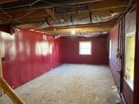 Additional Room in Basement which is Partially Finished (it's approximately 200 square feet but is not included in listed square footage).