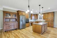 Beautiful open concept with knotty alder kitchen cabinets and fully handicap accessible