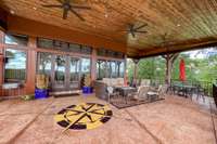 Large, Covered Patio off of Entertainment Space. 3 fans and Ample Lighting.