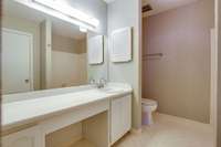 The second bathroom is located in the hallway, convenient to the second bedroom and guests.