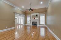 Beautiful hardwood floors, recessed lighting, and gas Fireplace in the Living Room