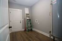 Nice size laundry room that leads to oversized one car garage