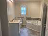 Soaking tub in the primary bath.