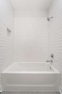 Tile shower in upstairs bath