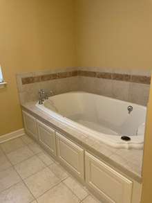 garden tub, tile floors