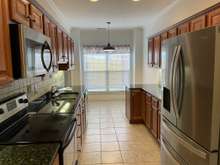 kitchen - ss appliances, tile backsplash, granite countertops, under cabinet lighting