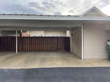 two car carport with storage room