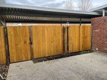 private fenced in back patio (new fence)