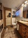 Master Bath with walk in closet .