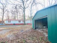 Another angle of the carport but could be easily made into a garage with door added