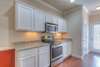 Stainless appliances and granite counters.