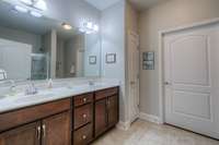 Large Bath with Double Vanities + Linen Closet