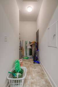 Deep Utility Closet with Shelves....Off of Laundry Room