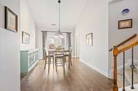 Dining room has vaulted ceiling