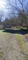 Driveway to carport.