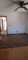 Looking from kitchen towards breakfast room and bedroom hallway.