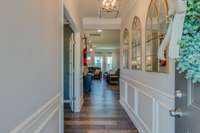 Inviting Entry Foyer w/ Upgraded Lighting and Wainscoting