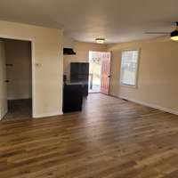 Beautiful knotty pine waterproof floors compliment the cabin!