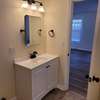 Brand new bathroom with new smart core flooring, Adjustable tilt vanity mirror, along with all new accessories!