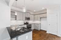 Custom Cabinets, Granite & Tile In Wet Areas Spacious and Open Kitchen