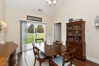 This view of the dining area shows the wonderful natural lighting and also, the beautiful cathedral ceiling.